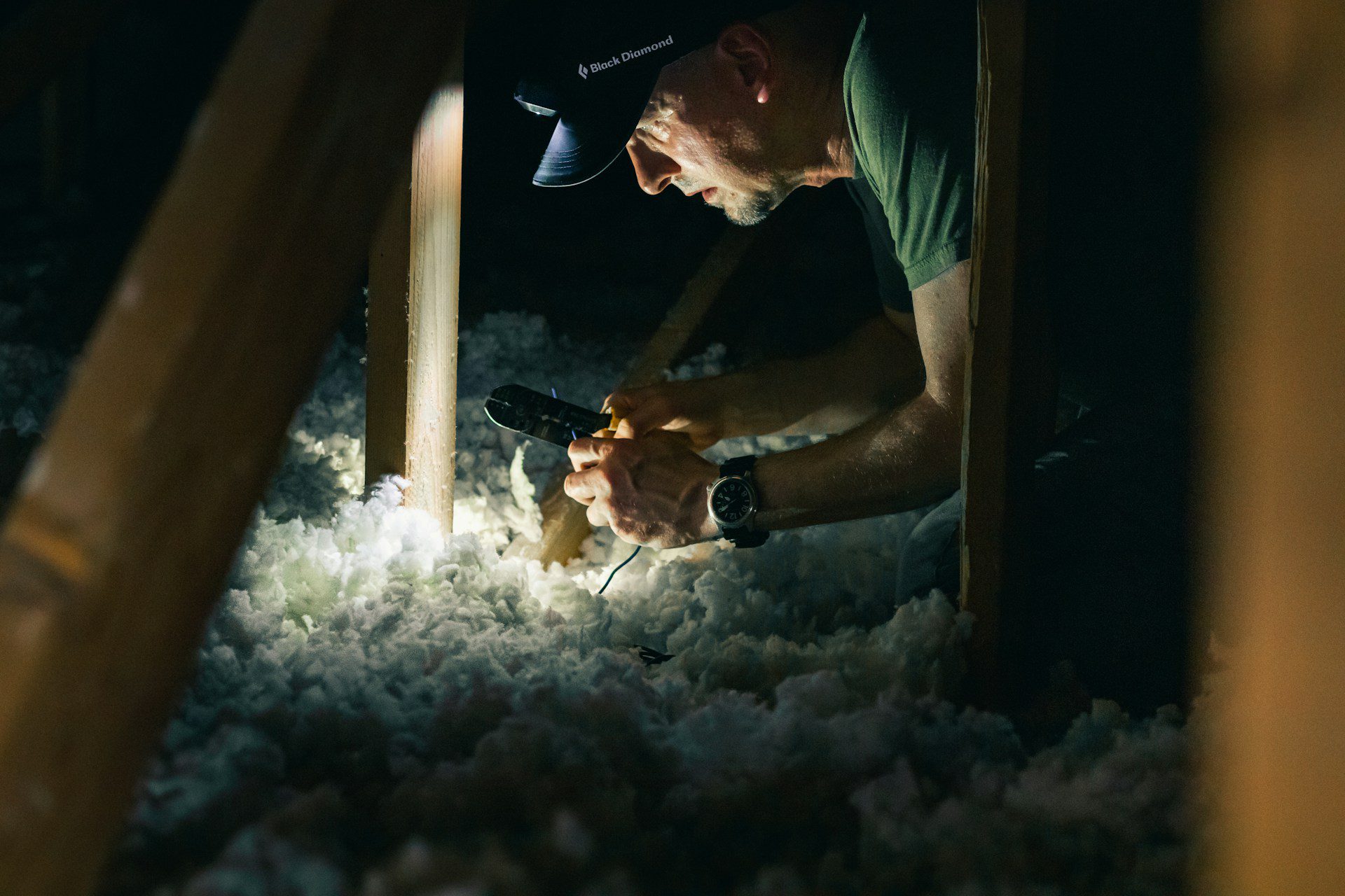 Specialist performing vermiculite insulation removal in Connecticut